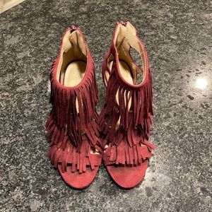 Maroon colored tassel heels size 7.5